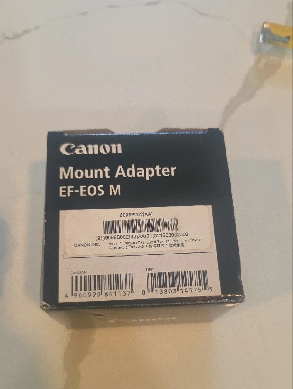 New In Box Canon Black and Silver EOS M Adapter with Tripod Mount